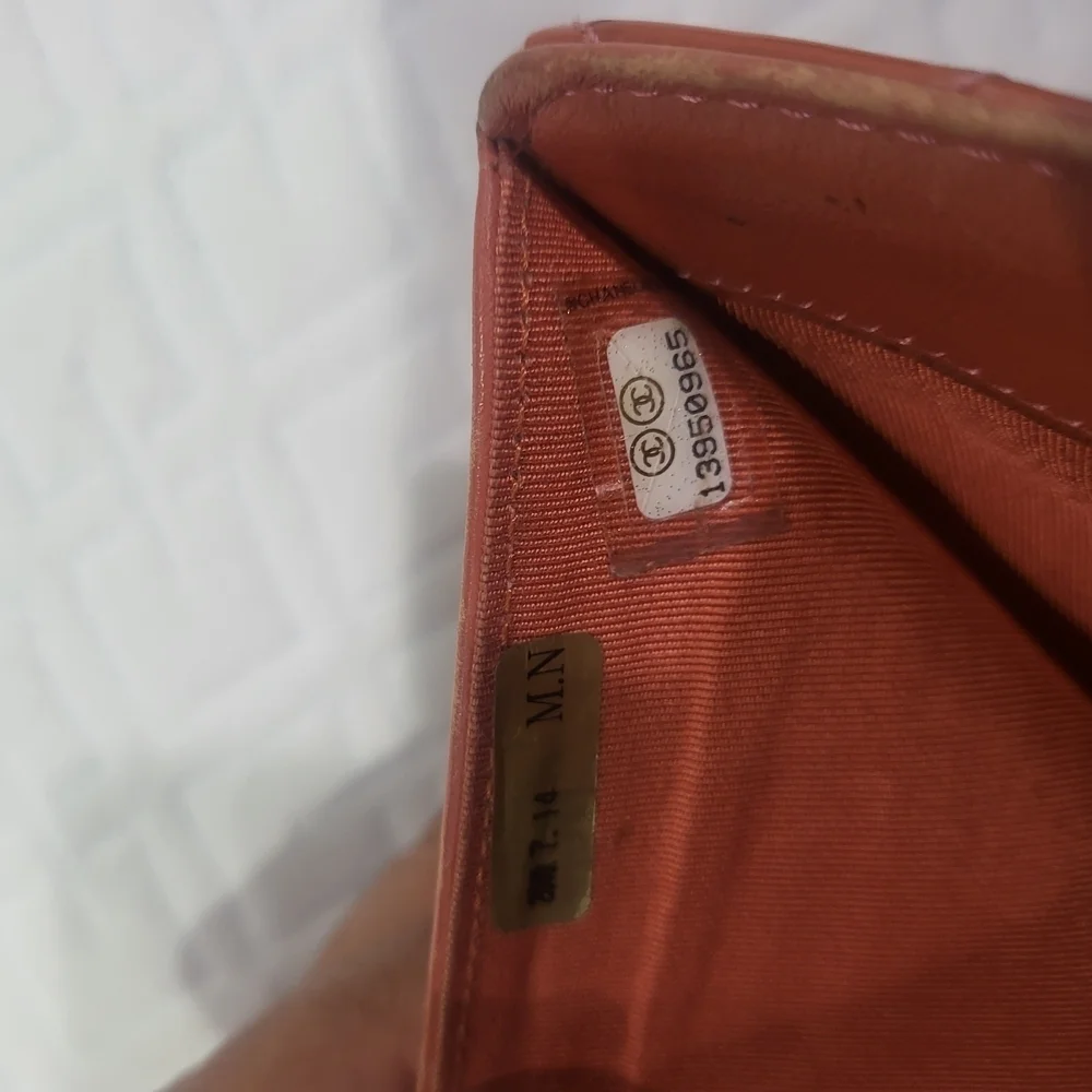 CHANEL Quilted Orange Matelasse Gold CC Logo Patent Leather Long Bifold Wallet.